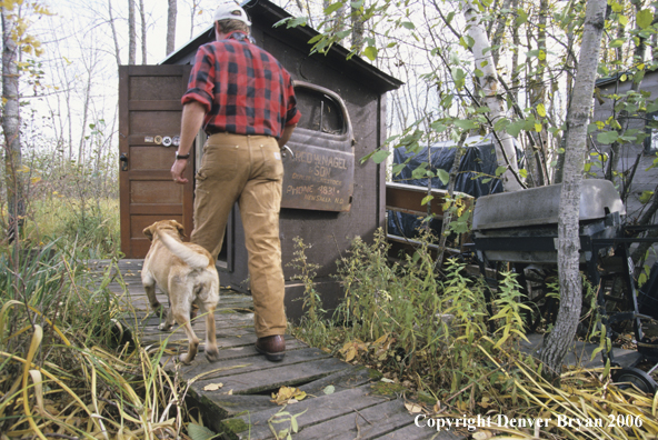 Yellow labrador with hunter.