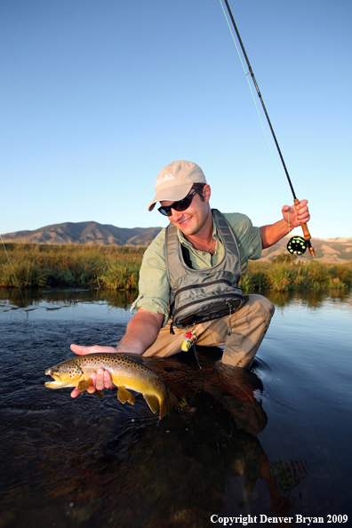 Flyfisherman with Brown Trout