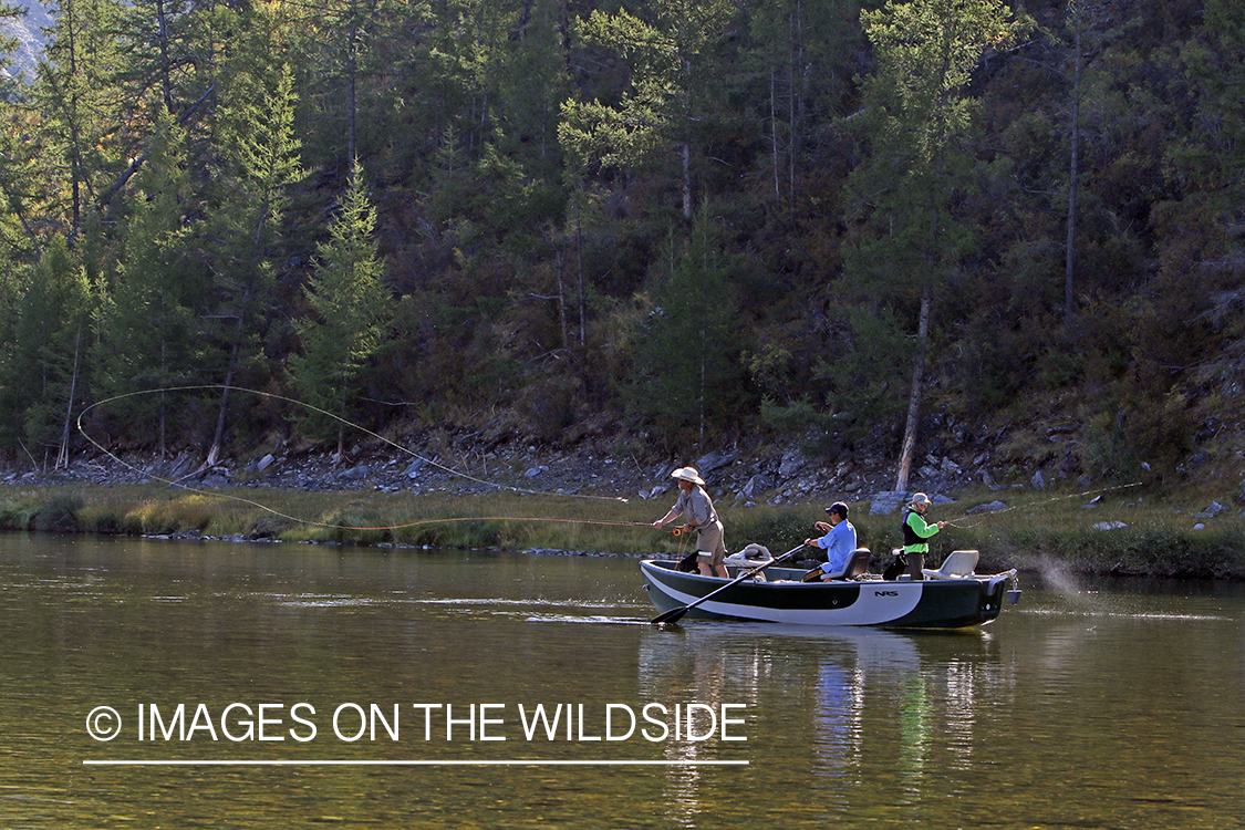 Flyfisherman casting spey/switch rod on Delger River, Mongolia.