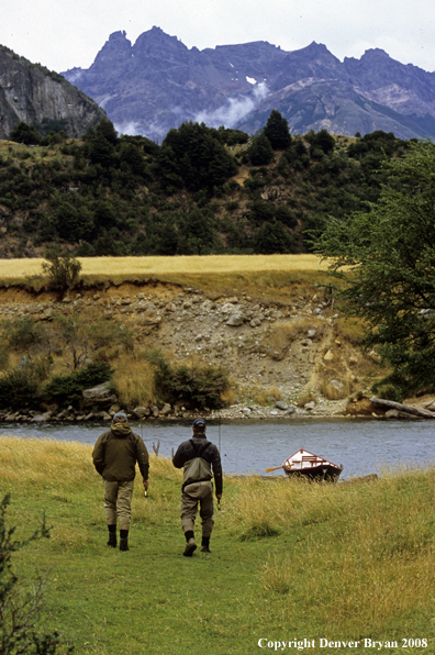 Flyfisherman walking to river