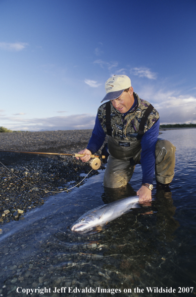 Flyfisherman with nice Silver Salmon