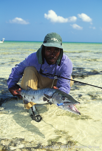 Saltwater flyfisherman with barricuda.