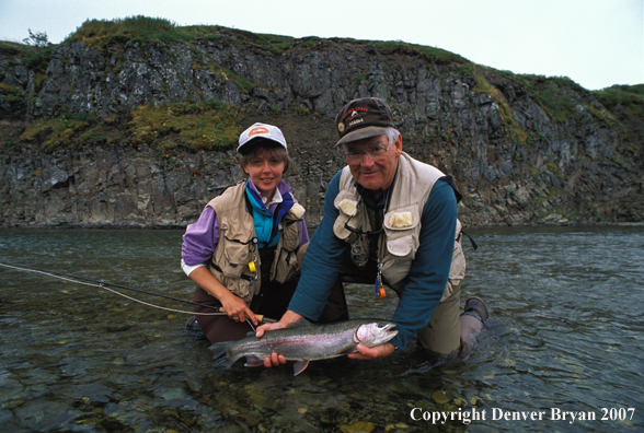 Flyfisherman and guide with rainbow trout.