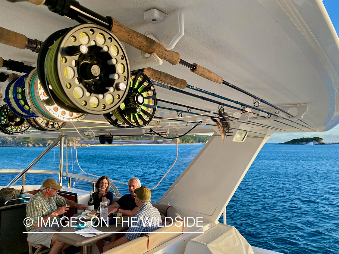 Flyrods hanging on boat.