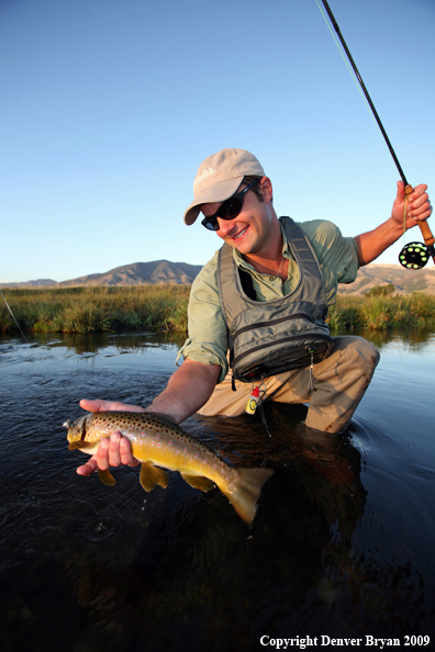 Flyfisherman with Brown Trout