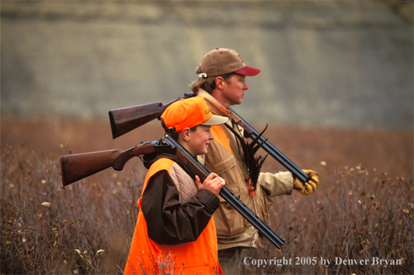 Father and son upland bird hunting.