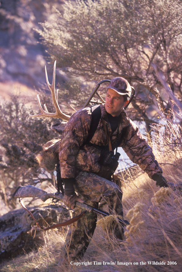 in-line muzzleloader hunter pack mule deer