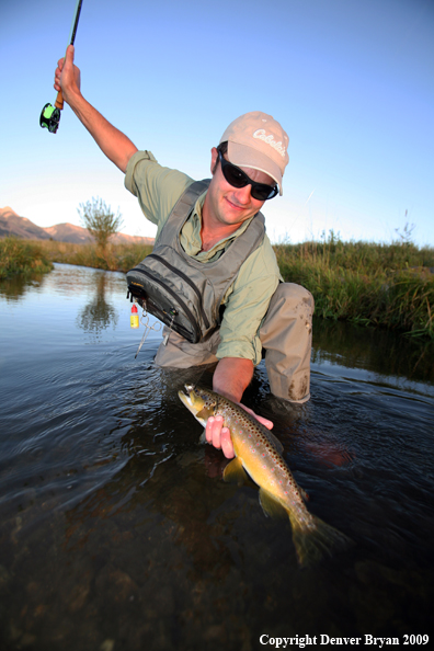 Flyfisherman with Brown Trout