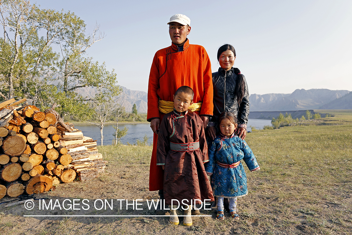 Mongolian family in traditional dress.