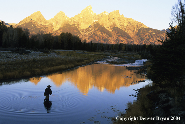 Flyfisherman casting on river.