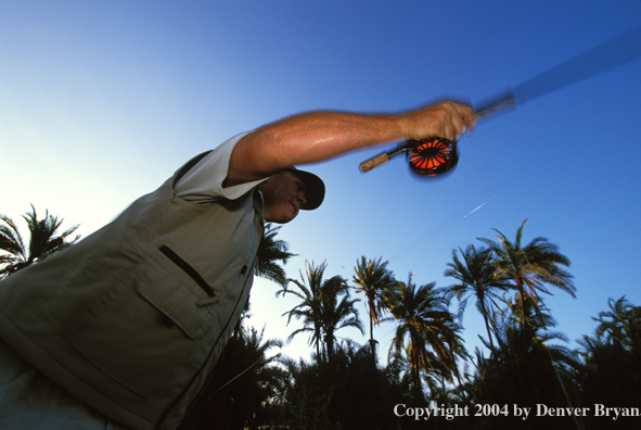 Flyfisherman casting. 