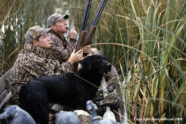 Father and son waterfowl hunting