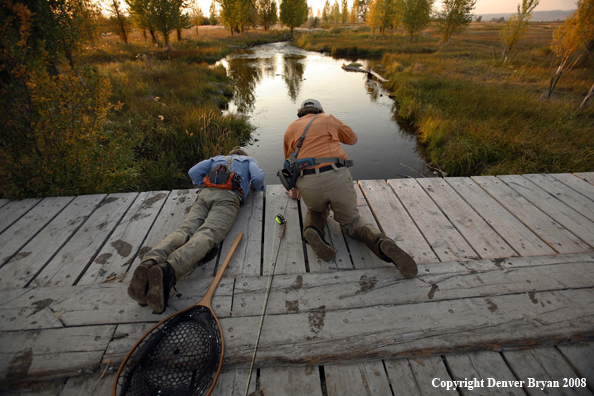 Flyfishermen on creek bridge