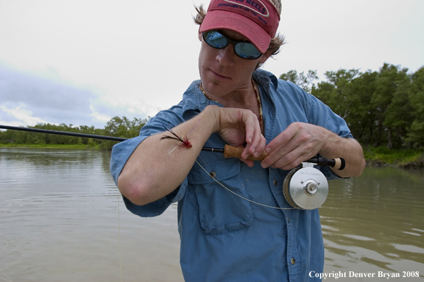 Flyfisherman w/hook on his arm