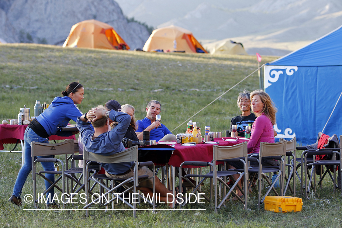 Guests at dinner along the Delger River, Mongolia.