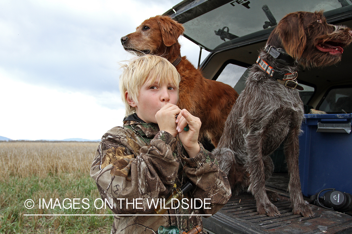 Father and son waterfowl hunters getting ready.