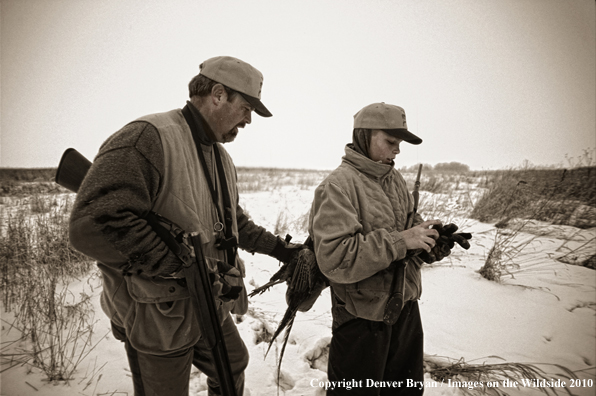 Father and son pheasant hunting. (Original image #10994-005.03)