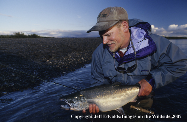 Flyfisherman with nice Silver Salmon