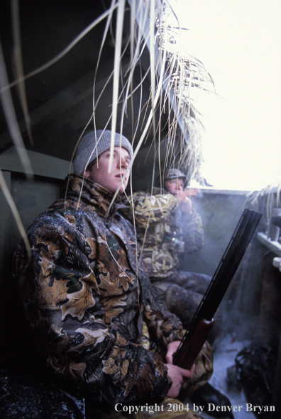 Waterfowl hunters calling for birds.