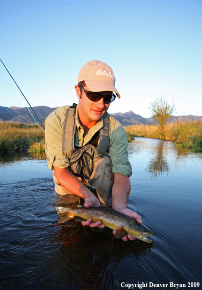 Flyfisherman with Brown Trout