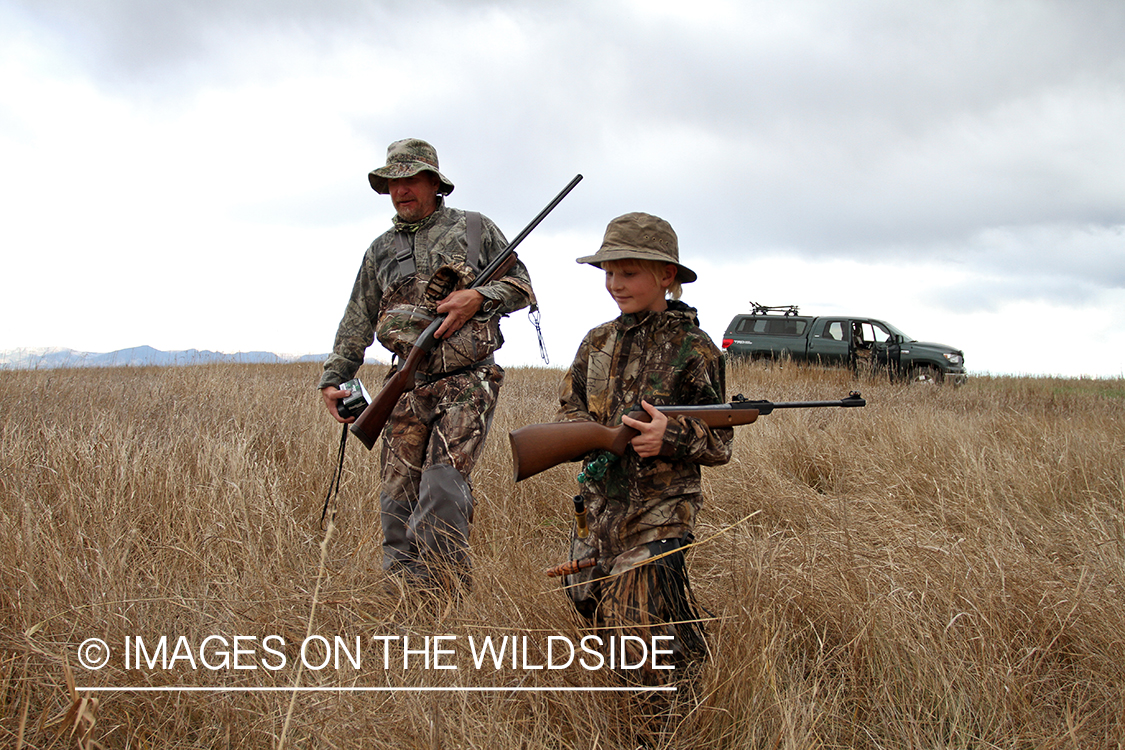 Father and son waterfowl hunting.