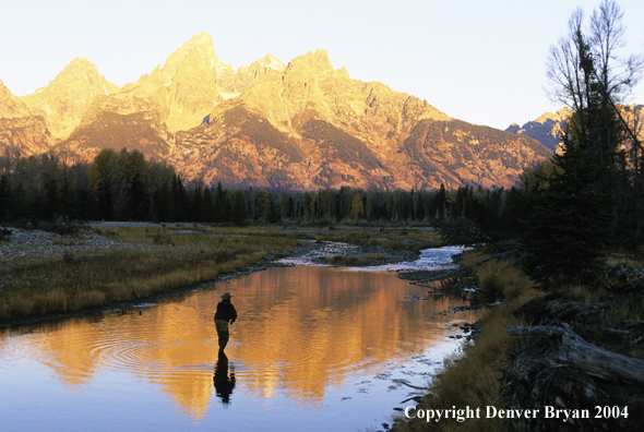 Flyfisherman casting on river.