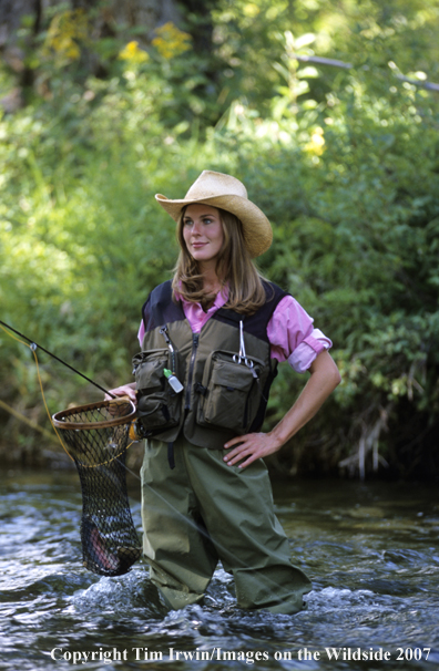 Woman freshwater flyfisher