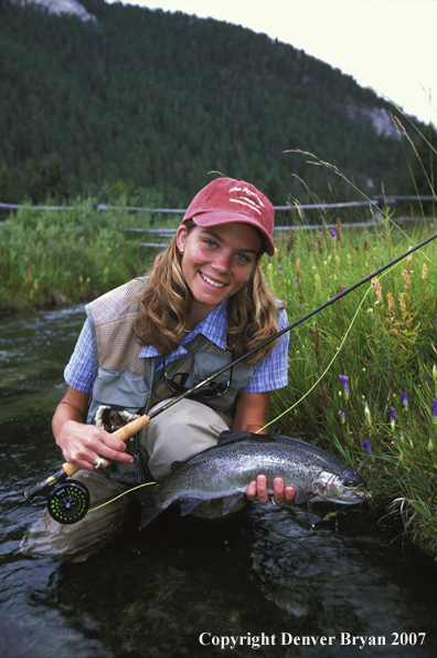 Flyfisher with rainbow trout.