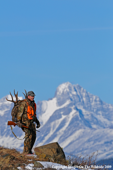 Hunter with deer rack