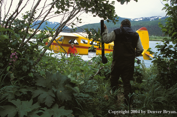 Flyfishermen at float plane.