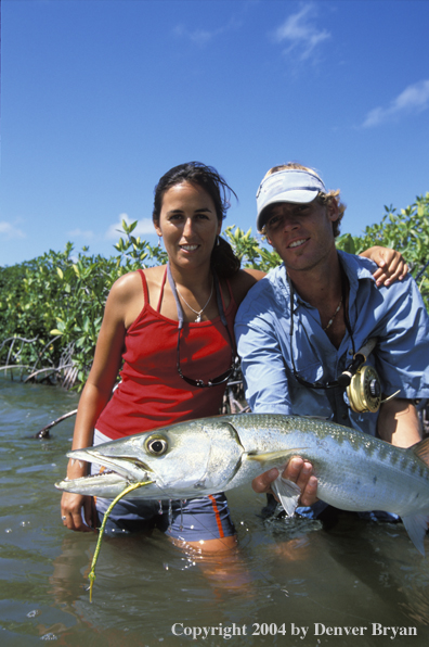 Saltwater flyfishers releasing barricuda.