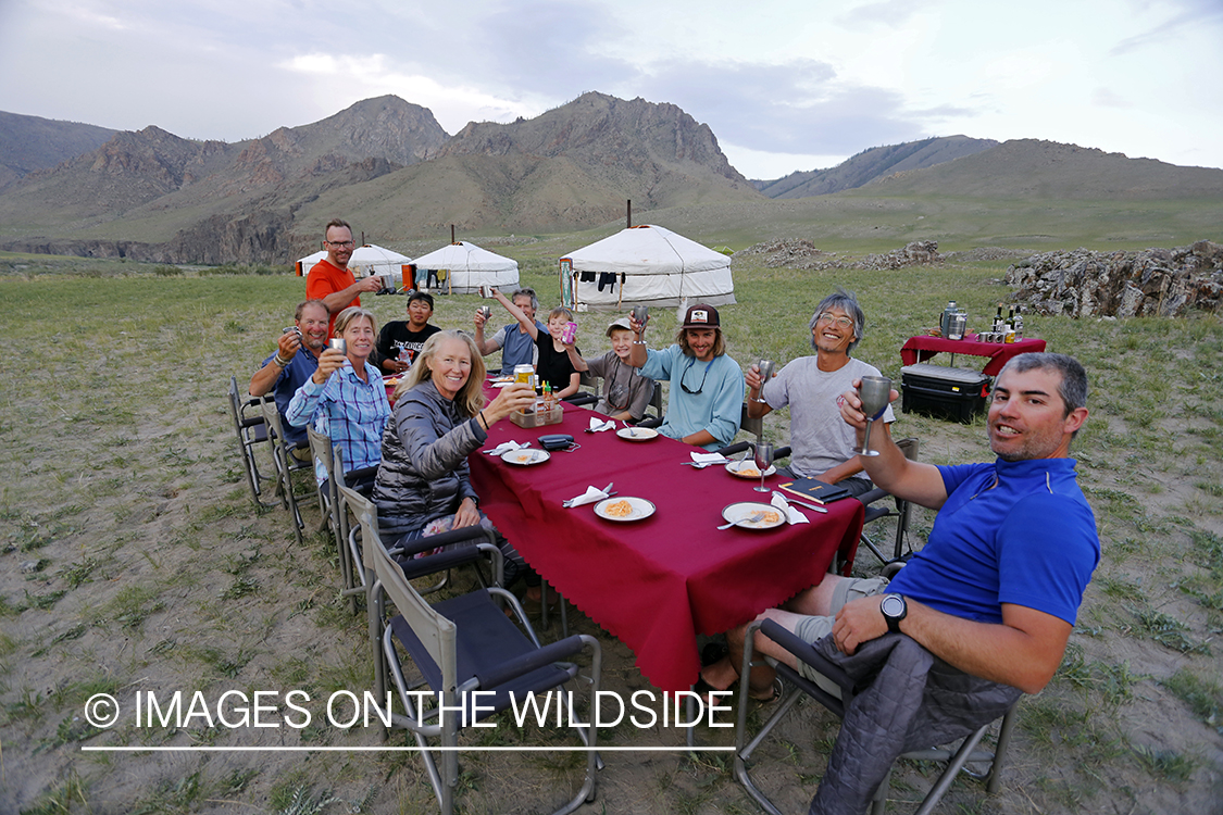 Guests at dinner along the Delger River, Mongolia.