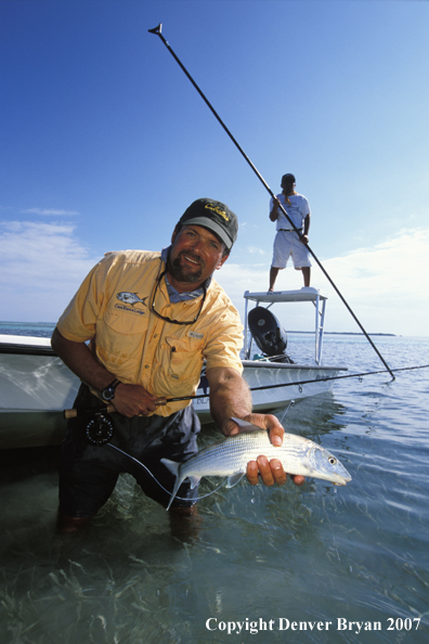 Saltwater flyfisherman holding bonefish.