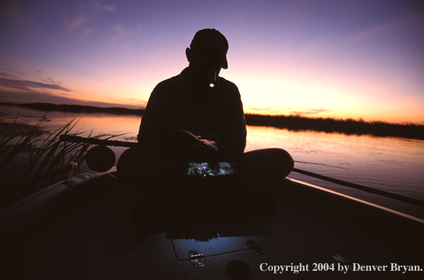 Flyfisherman choosing a fly.