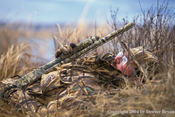 Waterfowl hunter waiting for birds.