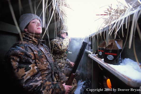 Waterfowl hunters calling for birds.