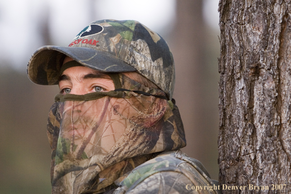 Turkey hunter in field