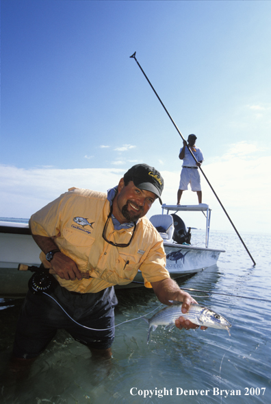 Saltwater flyfisherman holding bonefish.