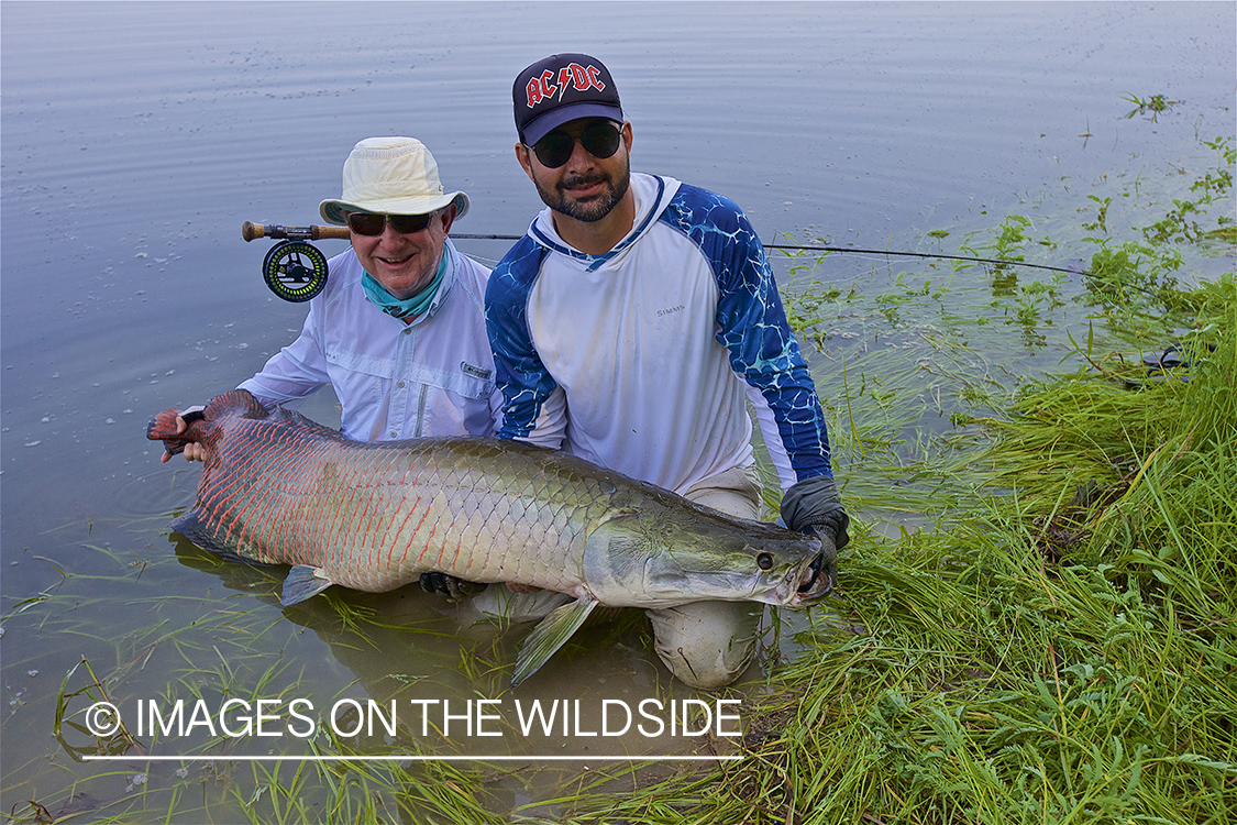 Flyfishermen with arapaima.