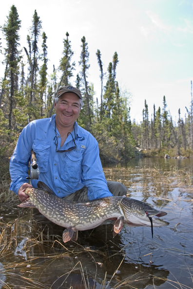 Flyfisherman with Northern pike (MR)