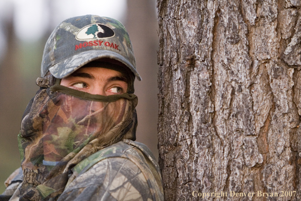 Turkey hunter in field