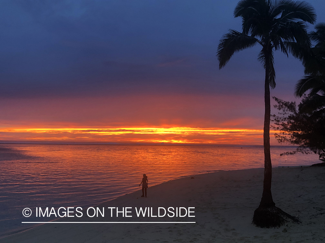 Sunset beach on Aitutaki Island.