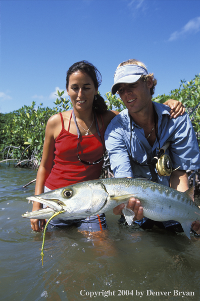 Saltwater flyfishers releasing barricuda.