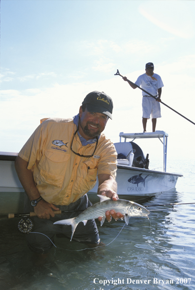 Saltwater flyfisherman holding bonefish.