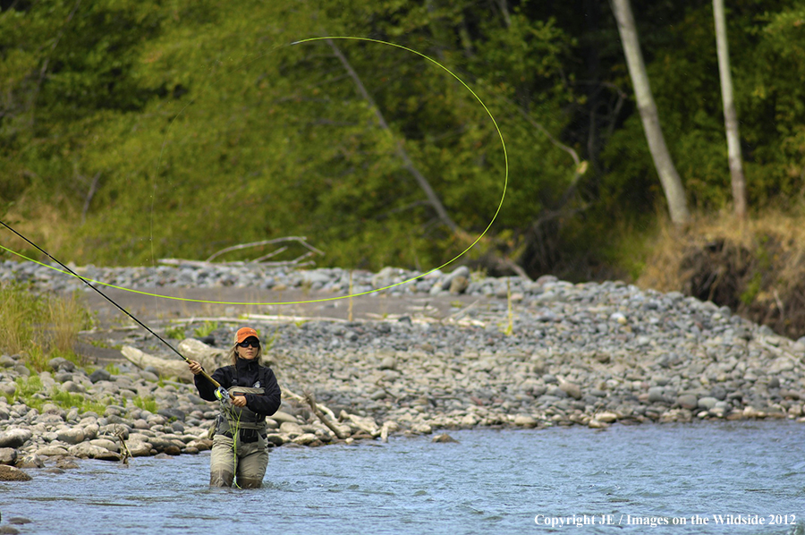 Flyfisher on river.