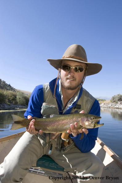 Flyfisherman with Rainbow Trout, Rocky Mountains