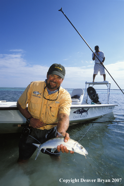 Saltwater flyfisherman holding bonefish.