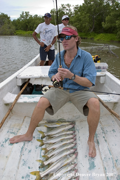 Flyfisherman w/snook catch 