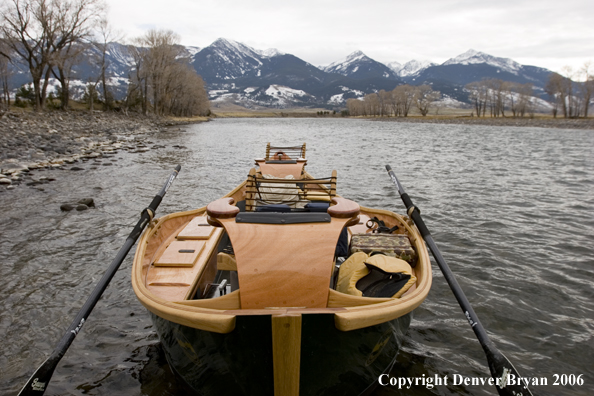 Drift boat on river.