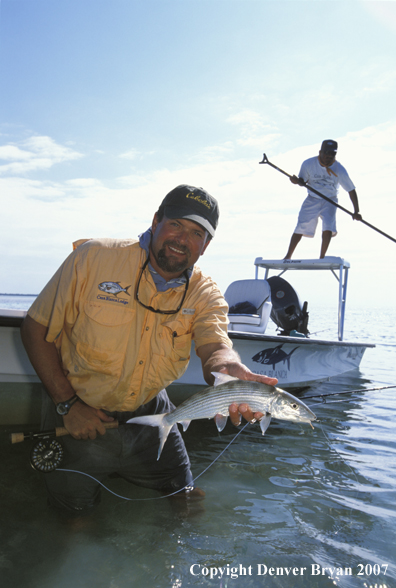 Saltwater flyfisherman holding bonefish.